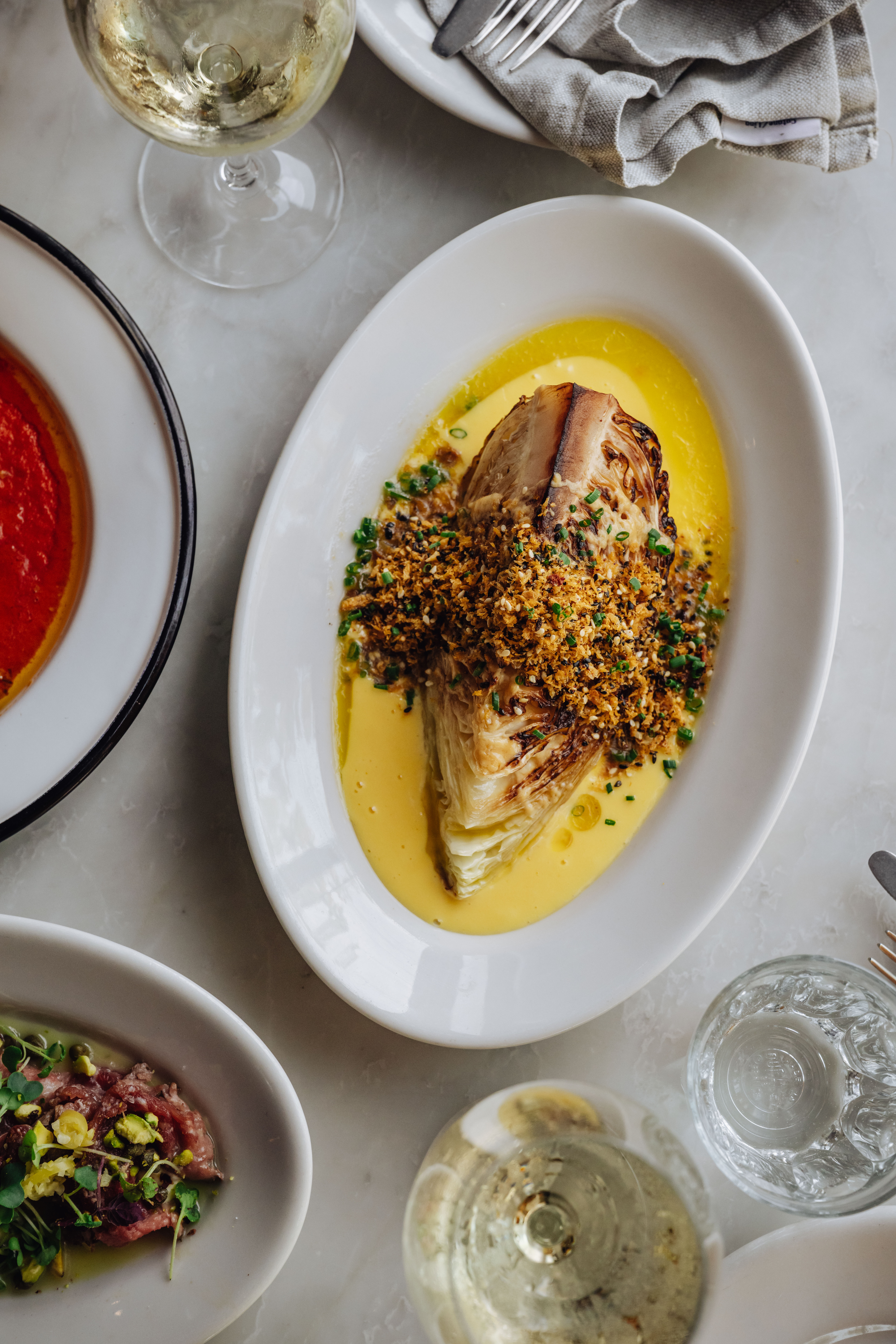 Bowl of marinated octopus with herbs and chilli in olive oil