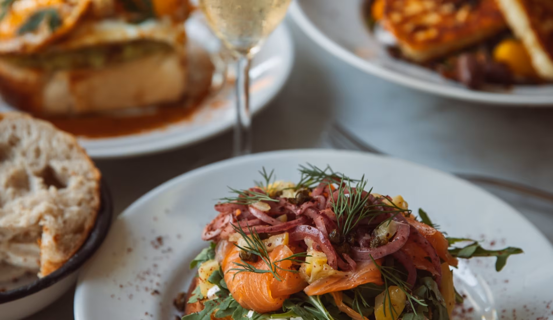 Brunch plate with salmon, salad and bread